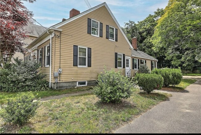 Side entrance and driveway - 245 East Ave