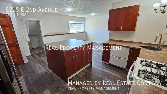 Building Photo - All Utilities Paid Fully Remodeled Ground ...