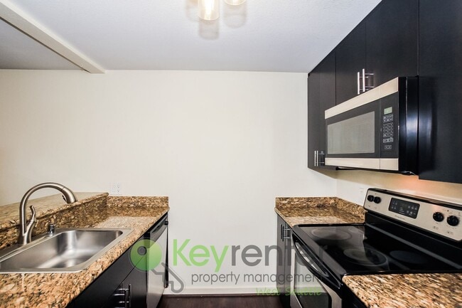 Building Photo - Live Easy in This Stylish 2-Bedroom with I...