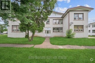 Building Photo - 145-145 North Service Rd E