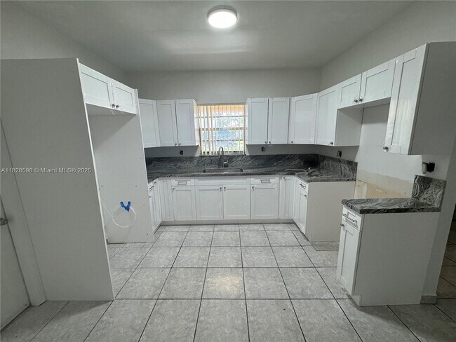 Building Photo - 613 NW 58th Ave