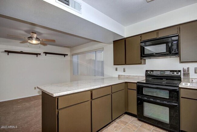 Building Photo - 1829 W Onza Ave