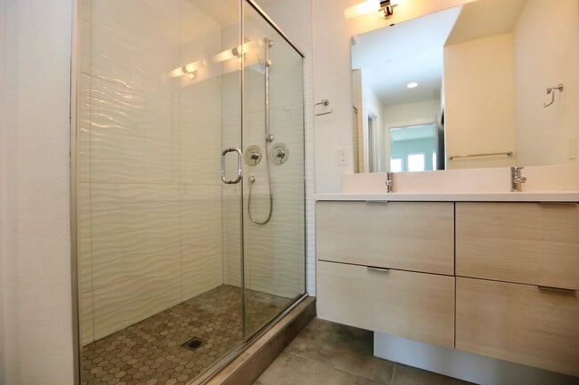 Updated bathroom with large walk-in shower & double vanities! - 1918 24th Ave S