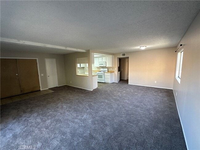 Building Photo - 16970 Marygold Avenue Unit 39