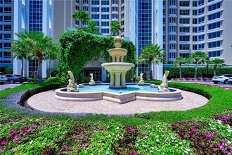 Building Photo - 7117 Pelican Bay Blvd