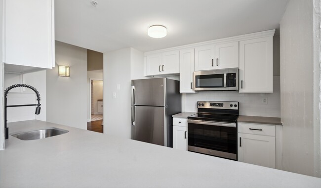 Enjoy your brand new kitchen with upgraded finishes - The Left Bank Apartments