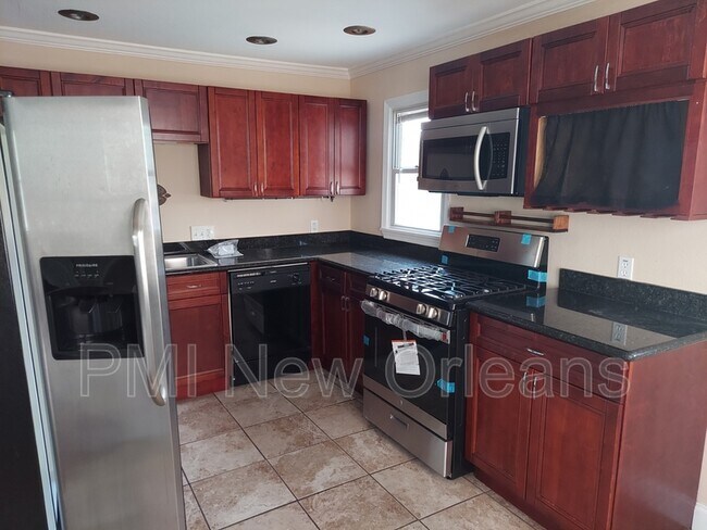 Building Photo - 6911 Louis XIV St