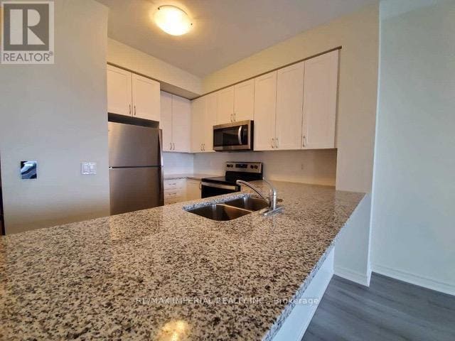 Photo du bâtiment - 349-1349 Rathburn Rd W
