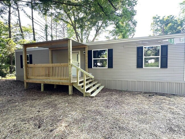 Building Photo - Brand new Efficiency 1 BR mobile home with large bonus room