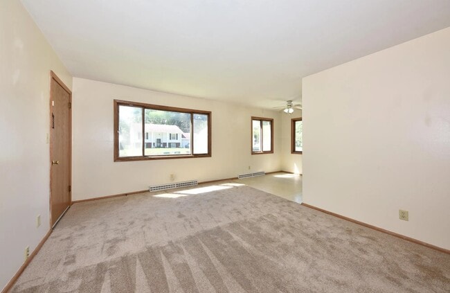 Unit was recently upgraded with high efficiency windows and new white trim with white baseboards. - W166N9108 Grand Ave