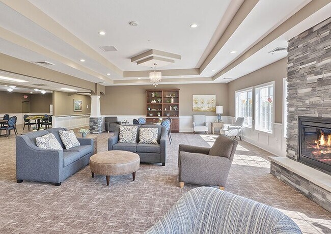 Zona de estar - Hampton Manor of Van Buren - Senior Living