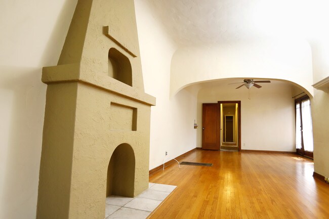 From the front door view, faux fireplace - 4240 E Vermont St