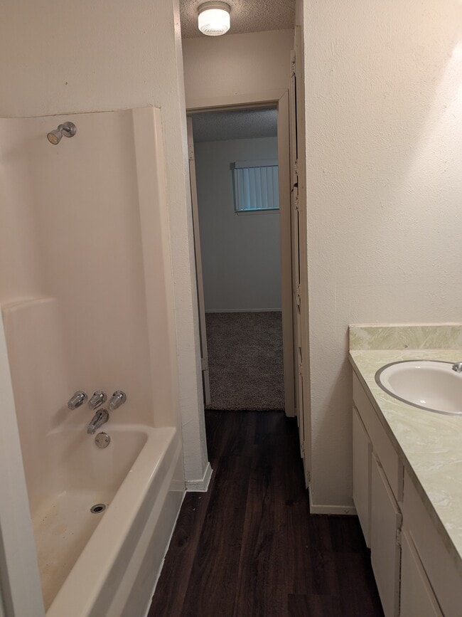 bath accessible from both bedrooms - 1800 Romack Ct