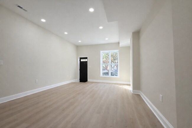 Building Photo - Modern 3BR Rowhome with Finished Lower Level & Rear Deck