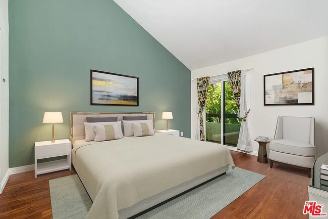 Vaulted ceilings in master bedroom, and balcony views - 5955 W 8th St