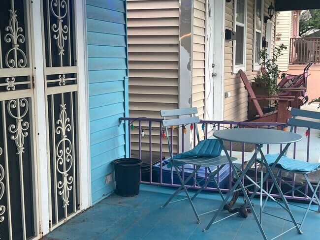 Porch table and chairs - 2426 Lapeyrouse St