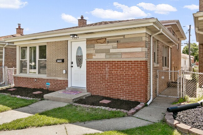 Foto del edificio - 7704 McVicker Ave