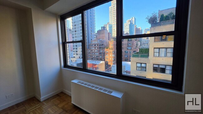 Building Photo - Sunlit 11th-Floor Corner 1-Bed with Skyline Views in Turtle Bay