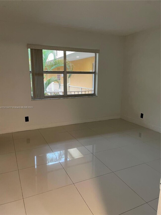 Building Photo - 18101 NW 68th Ave