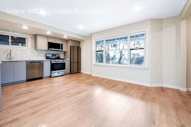 Building Photo - Luxury Rebuilt 4-Bedroom Upper-Level Suite...
