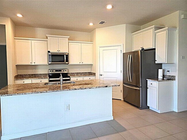 Building Photo - 3908 Mossy Limb Ct