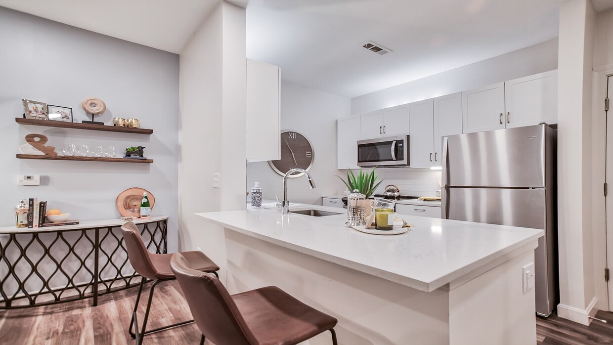 Cocinas gourmet en nuestros apartamentos renovados - Windsor at Oak Grove