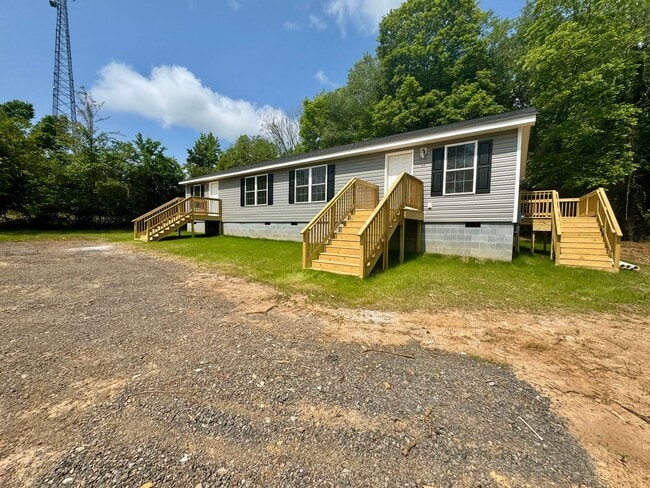 Building Photo - The Home You’ve Been Searching For! *Utilities & Furniture can be added with a rental premium.*