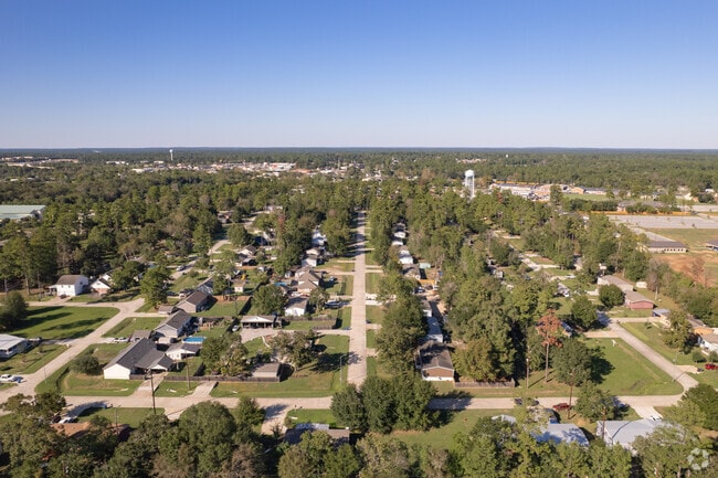 An aerial view of Magnolia shows off the wooded landscape.