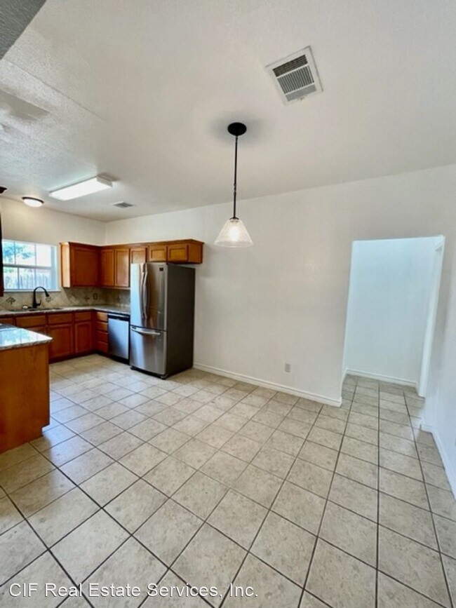 Building Photo - 4 br, 2 bath House - 10317 Peony Ln.