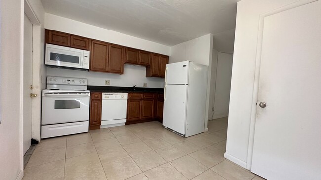 Building Photo - 1651 W Oak Ridge Rd Unit A Orlando, FL 32809