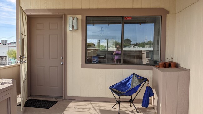 Front door and second story deck. - 4747 E 1st St