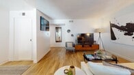Located at 5474 Reservoir Dr in the Del Cerro neighborhood of San Diego, CA, this single-story home offers a well-organized layout with a cohesive, modern aesthetic throughout. The spacious living room features warm light wood flooring, a textured ceiling, and large windows that allow ample natural light to fill the space. Clean white walls provide a neutral backdrop, complemented by tasteful décor including a bold abstract wall piece that adds a contemporary touch. The kitchen is efficiently designed with white shaker-style cabinetry, dark countertops, and a full suite of stainless steel appliances, including an electric range, over-the-range microwave, and dishwasher. Light wood flooring continues here, and a window above the sink brings in additional daylight. The bedroom is a calm, carpeted retreat with crisp white walls and direct access to an adjacent walk-in closet or hallway. A flexible secondary room with carpet flooring and a large window serves well as a home office or additional sleeping space. The full bathroom is cleanly appointed with a white vanity, wood-tone flooring, and a shower-tub combo. A tiled entry area with sliding glass door access adds functional transition space between the interior and exterior of the home.