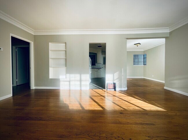 Living Room (with dining room & kitchen in background) - 2909 Park Blvd