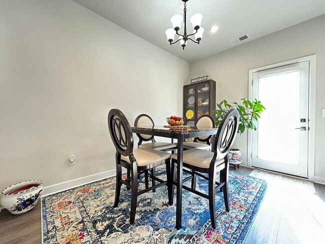 Building Photo - Welcome to this inviting 3-bedroom Condo! ...