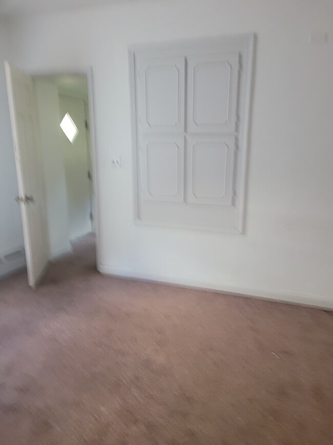 Main bedroom with shelving. - 1413 Darby Rd
