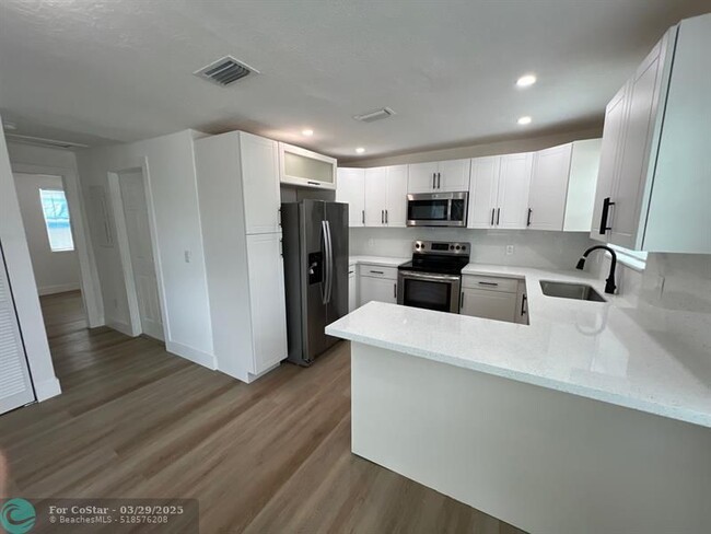 Building Photo - 10540 NW 28th Ave