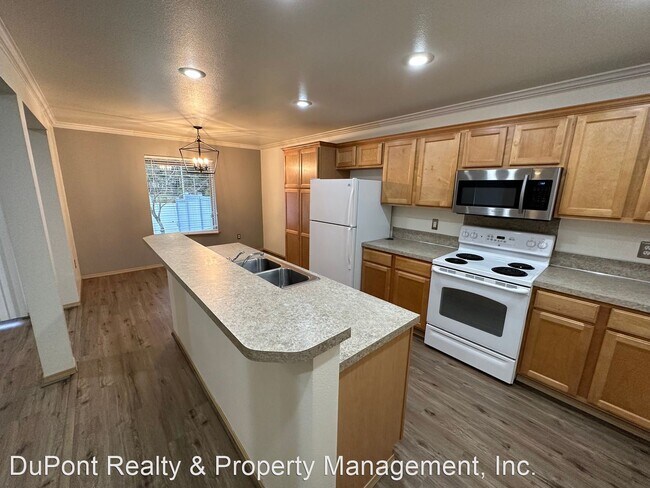 Building Photo - 3 br, 2.5 bath House - 7520 48th lane SE
