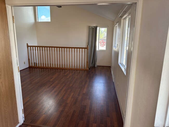 Back living area in the unit - 1876 Palamoi St