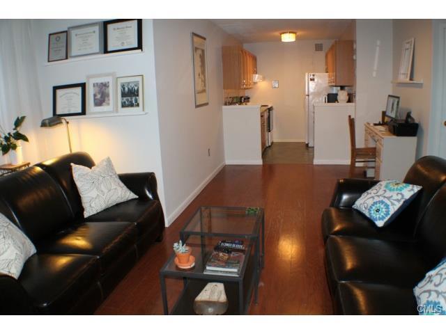 Living room looking toward kitchen - 44 Strawberry Hill Ave