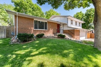 Building Photo - 7426 S Quince Ct