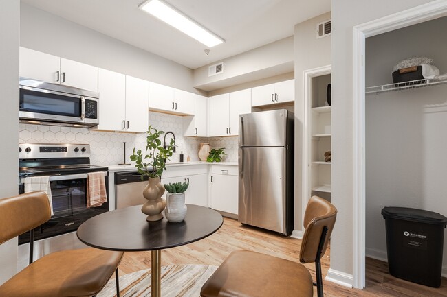 Newly Renovated Kitchen with Stainless Steel Appliances - Deep Deuce at Bricktown Apartments