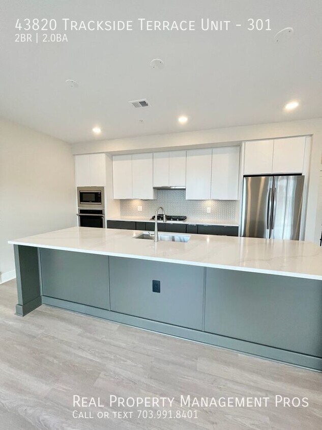 Primary Photo - Brand New Luxury 2 Bedroom + Den Garage Co...