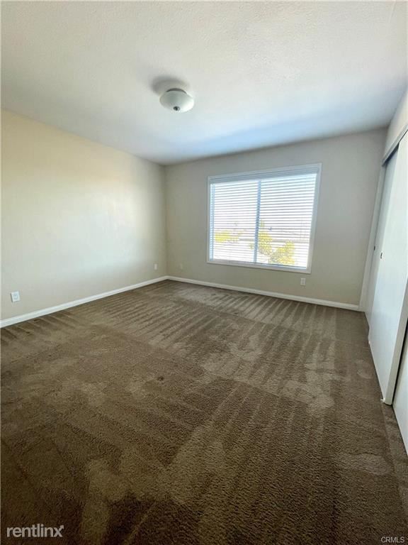 Foto principal - 2 br, 1.5 bath Condo - 660 W 29th St Apt 2