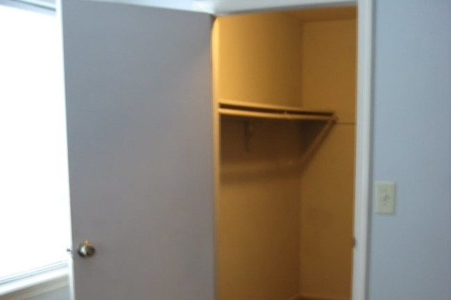 Walk-In Closet in Master Bedroom - 133 Woodmill Dr