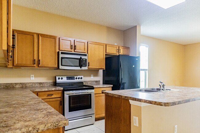 Building Photo - 4220 Plantation Oaks Blvd