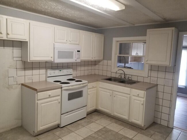 Foto del edificio - 9453 Old Plank Rd