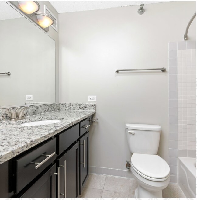 Clean, modern, bright bath - 200 W Ohio St