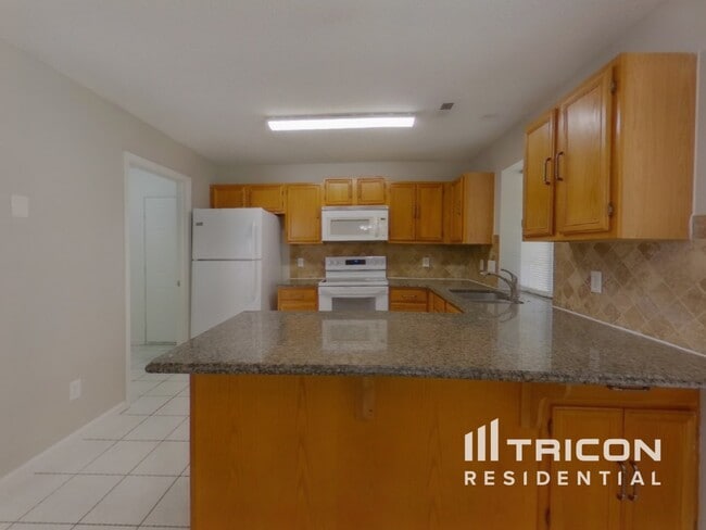 Building Photo - 5000 Poplar Glen Dr