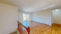 Located at 4 Koster Blvd in Edison, NJ, this well-maintained one-bedroom, one-bathroom residence offers a thoughtfully arranged layout across a single floor. Gleaming hardwood floors flow throughout the living areas, reflecting abundant natural light and lending a warm, inviting ambiance to the entire space.

The living room is generously sized, featuring a sliding glass door that opens to a private balcony, providing pleasant outdoor views. It connects seamlessly to a separate dining room, creating a natural flow ideal for everyday living and entertaining. The kitchen is equipped with rich warm-toned wood cabinetry offering ample storage, light countertops, a gas range, and tile flooring, with a window that brightens the space throughout the day.

The spacious primary bedroom features hardwood floors, a large window that allows natural light to pour in, and direct access to a dedicated closet. Additional closet space is distributed throughout the unit, offering excellent storage solutions. The bathroom includes a full tub-shower combination with clean white tile surround.

A hallway connects the key areas of the home, and a staircase provides access to and from the unit. The clean, neutral palette throughout makes this a versatile and move-in ready residence in Edison, NJ.