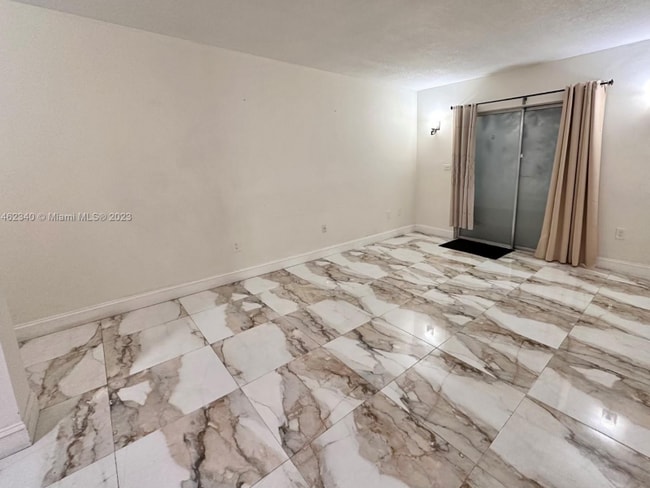 Building Photo - 4265 NW S Tamiami Canal Dr
